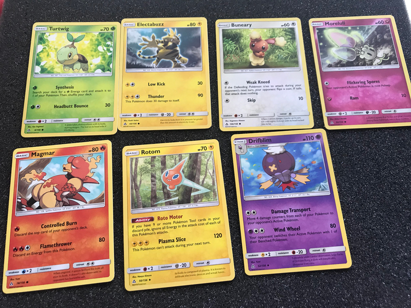 Illustration for article titled Let's Open Some Pokemon Ultra Prism Cards And See If There's Anything Good